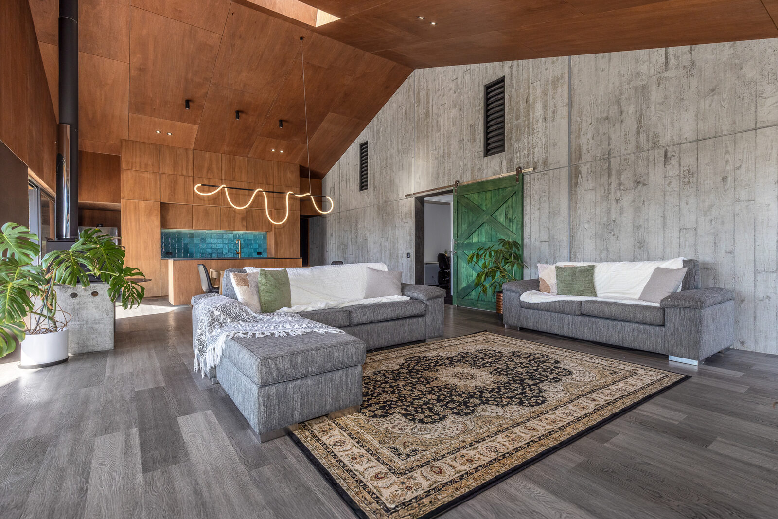 Open-plan living and dining with harbour views